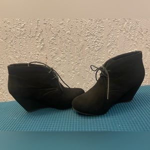 Black wedge booties